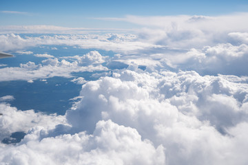 Wall Mural - blue sky with the clouds from the plane view