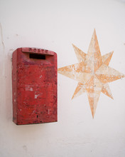 Red Weathered Mailbox Accepts Mailings In All Cardinal Directions