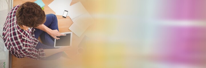Poster - Overhead of man using tablet with rainbow transition