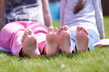 Heels Of Girls On A Meadow