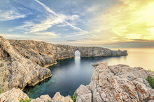 The Rock Formation Bridge Located On The West Coast Of Menorca Spain Offers One Of The Most Extraordinary Sunsets
