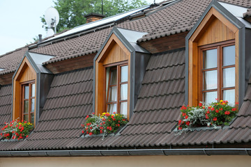 Wooden roof decorated with beautiful flowers 