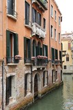 Fototapeta Uliczki - colorful houses and canal in Venice, Italy
