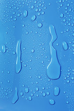 Big Drop And Droplets, Blue Background