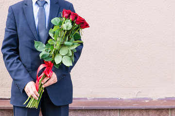 man with bouquet of flowers