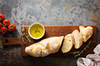 Homemade baguette with olive oil and salt