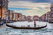 Men In Gondola On Canal In City Against Sky, Venice, Italy