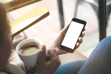 Aufkleber - selective focus on woman hand holding phone sitting in coffee shop