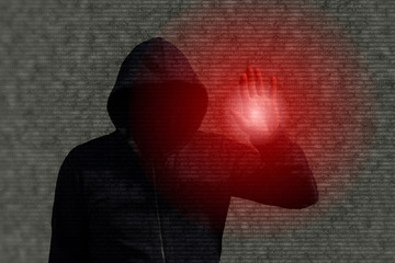 Wall Mural - Hooded hacker infiltrating a computer program