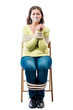 Connected young hostage in a chair on a white background