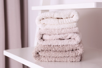 Wall Mural - Stack of clean towels on shelf