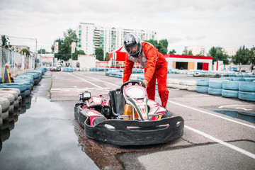 Wall Mural - Kart racer on start line, go cart driver