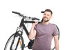 © Africa Studio - Handsome young man with bicycle on white background