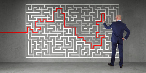 Poster - Businessman searching maze solution on a wall 3D rendering