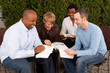 © digitalskillet1 - Men's Group Bible Study. Multicultural small group.