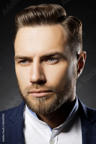 Close Up Portrait Of Handsome Young Man With Modern Fashion Hair