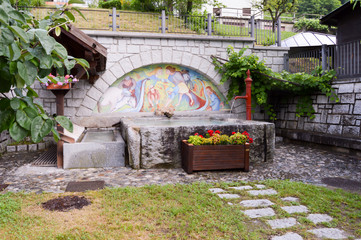 Wall Mural - Blue stone fountain