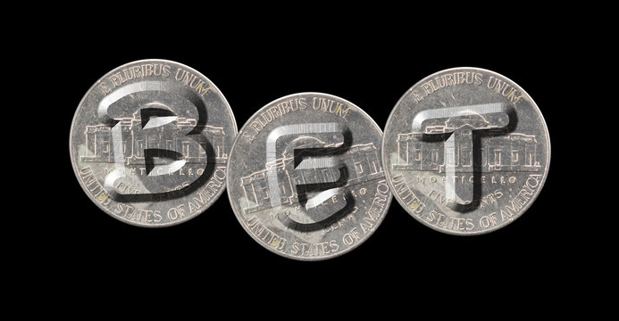 BET – Coins on black background