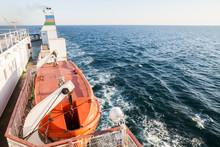 Orange Lifeboat On Passenger Ship