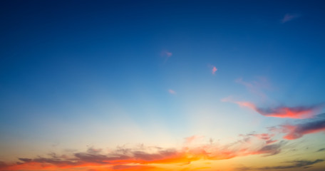 orange clouds and blue sky at dusk