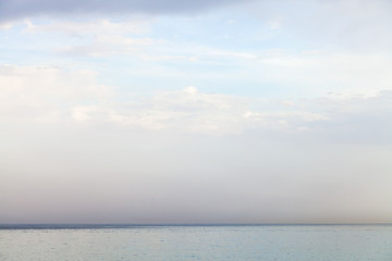 Canvas Print - blue sky with white clouds over Ionian Sea