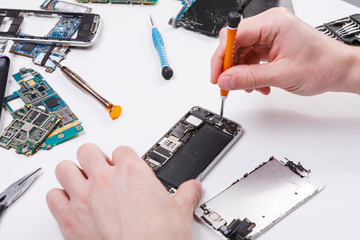 Poster - Repairman disassembling phone with screwdriver