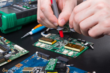 Poster - Electronic circuit board inspecting close up