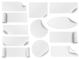 set of white paper stickers of different shapes with curled corners isolated on white background. ro