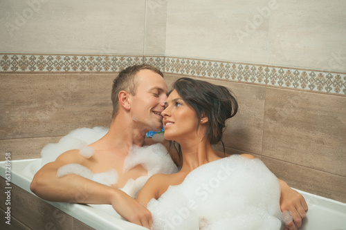 500px x 334px - Happy young couple in bathroom. Bathroom couple. Sex photo ...