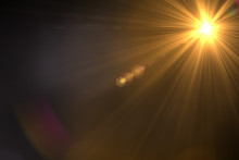 Lens Flare Light Over Black Background. Easy To Add Overlay Or Screen Filter Over Photo