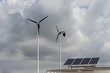 © warut - wind turbines and Solar Cell with cloudy background