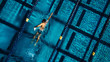 © Connect Images - Overhead view of swimmer in pool