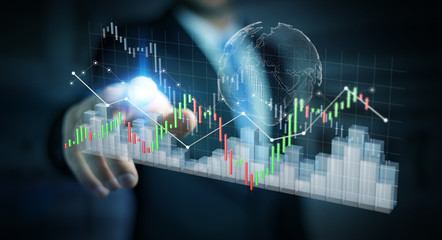 Businessman using digital 3D rendered stock exchange stats and charts