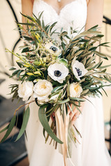 decorated wedding area with flowers on wooden background