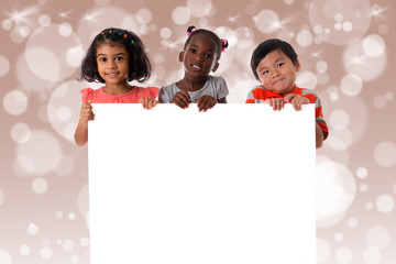 Wall Mural - Group of multiracial kids portrait with white board.Isolated