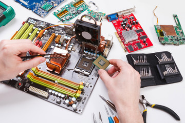 Poster - Technician plug in microprocessor to motherboard