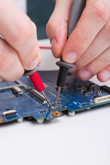 Poster - Laptop motherboard testing in service center