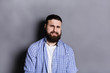 © Prostock-studio - Bearded man expressing disgust, grimacing