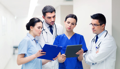 Wall Mural - group of medics with clipboards at hospital