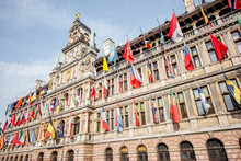 View On The City Hall With Flags On Grote Markt Square In Antwerpen City, Belgium