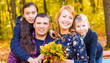 © satura_ - Family, nature, autumn and people concept - Portrait of Happy mother, father, son and daughter in fall