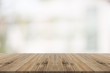 © sorrapongs - Wood table top on white blurred background from building,for montage your products