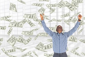 Poster - Excited business man with money rain against white background