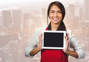 Poster - Shop owner holding up tablet against blurry skyline