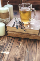 Poster - Herbal tea and reading on rustic windowsill