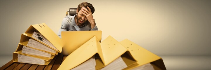 Fototapete - Stressed and tired man with lots of files table