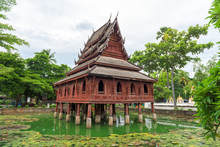Ancient Wooden Monastery At Wat Thung Si Muang In Ubon Ratchathani Province, Thailand
