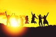 Silhouette picture style of happy jumping people. For concept like win or success.