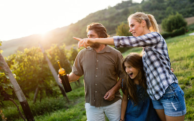 Wall Mural - Wine grower and people in vineyard