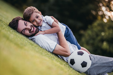 Sticker - Dad with son playing football